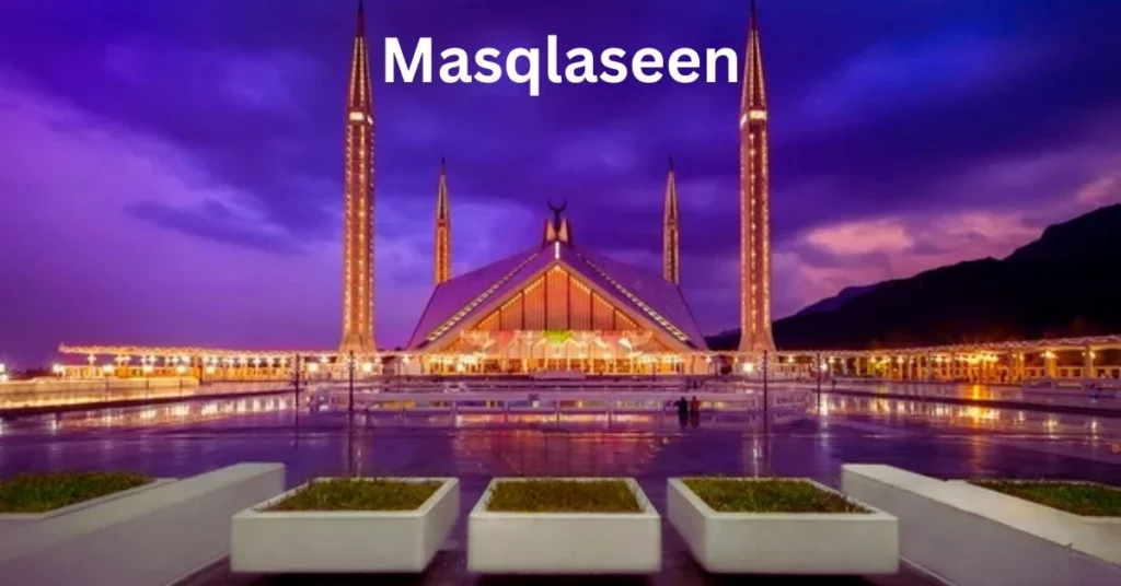 Faisal Mosque with towers and a purple sky Masqlaseen