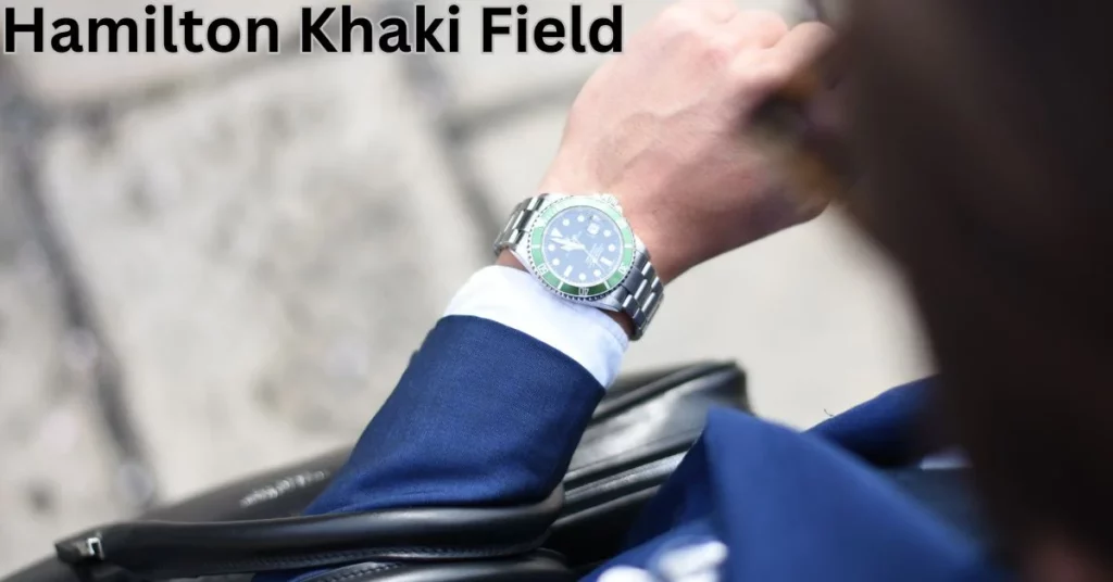 a person wearing a watch hamilton khaki field