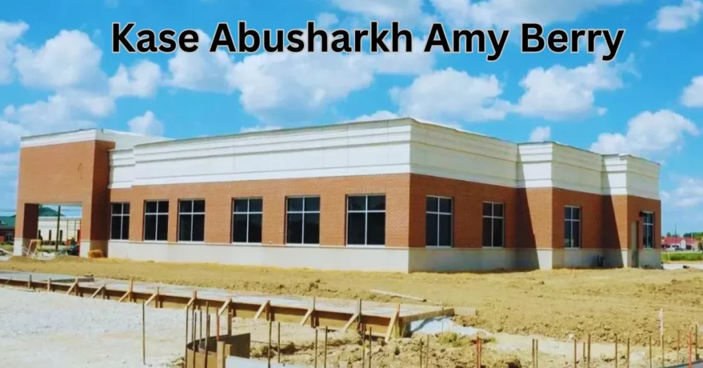 a building under construction with a blue sky Kase Abusharkh Amy Berry
